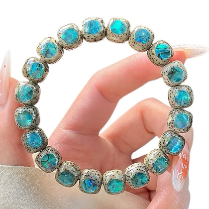 Aurora · Bodhi Seeds Fidget Bracelet · Abalone Shell Inlay