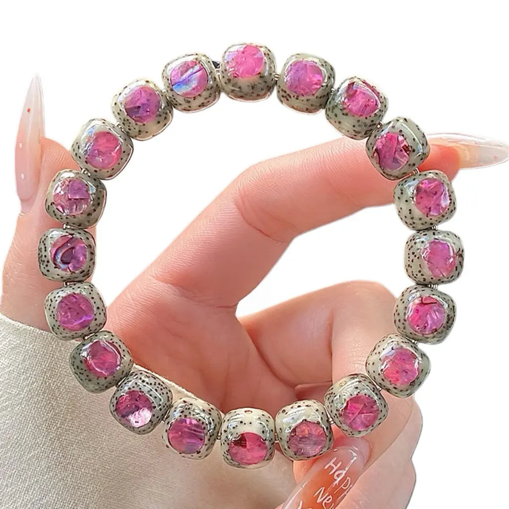 Aurora · Bodhi Seeds Fidget Bracelet · Abalone Shell Inlay